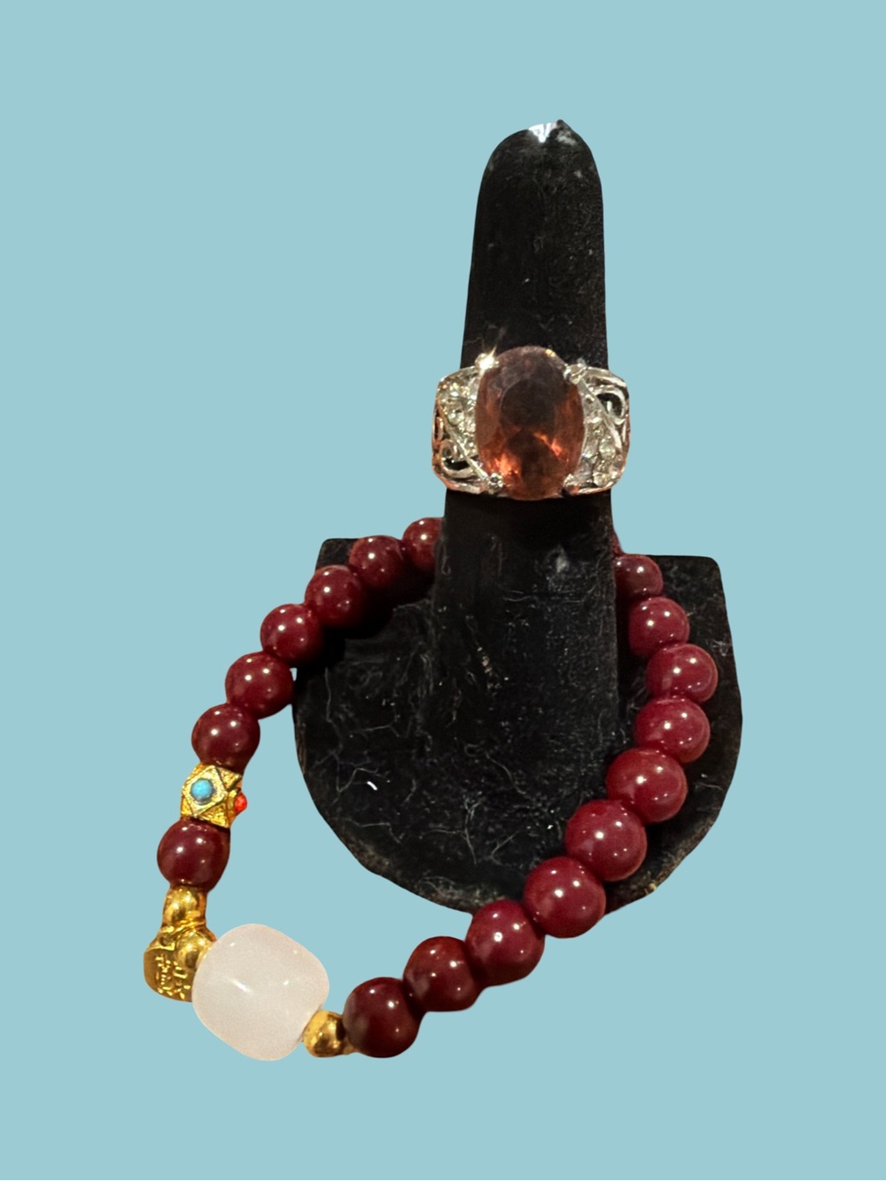 Elegant Maroon Beaded Bracelet with White Accent and Gold Details and ring